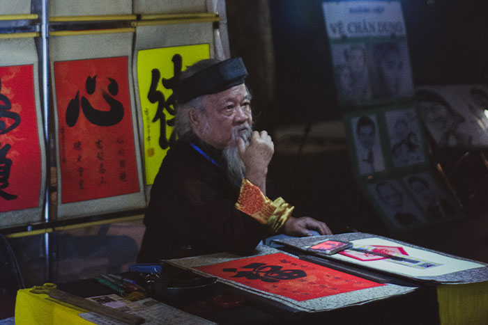 Traditional caligraphy on Hoan Kiem walking street